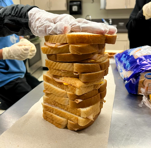 Sandwiches being stacked